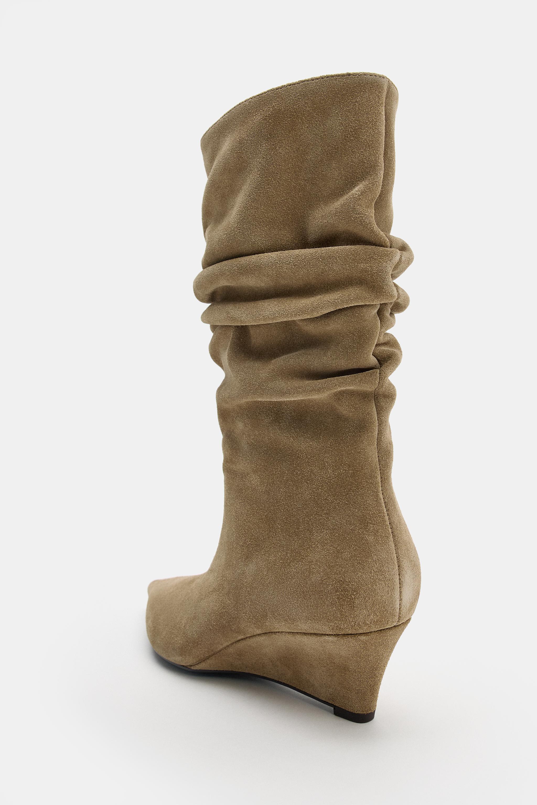 BOTTINES À TALONS COMPENSÉS EN CROÛTE DE CUIR